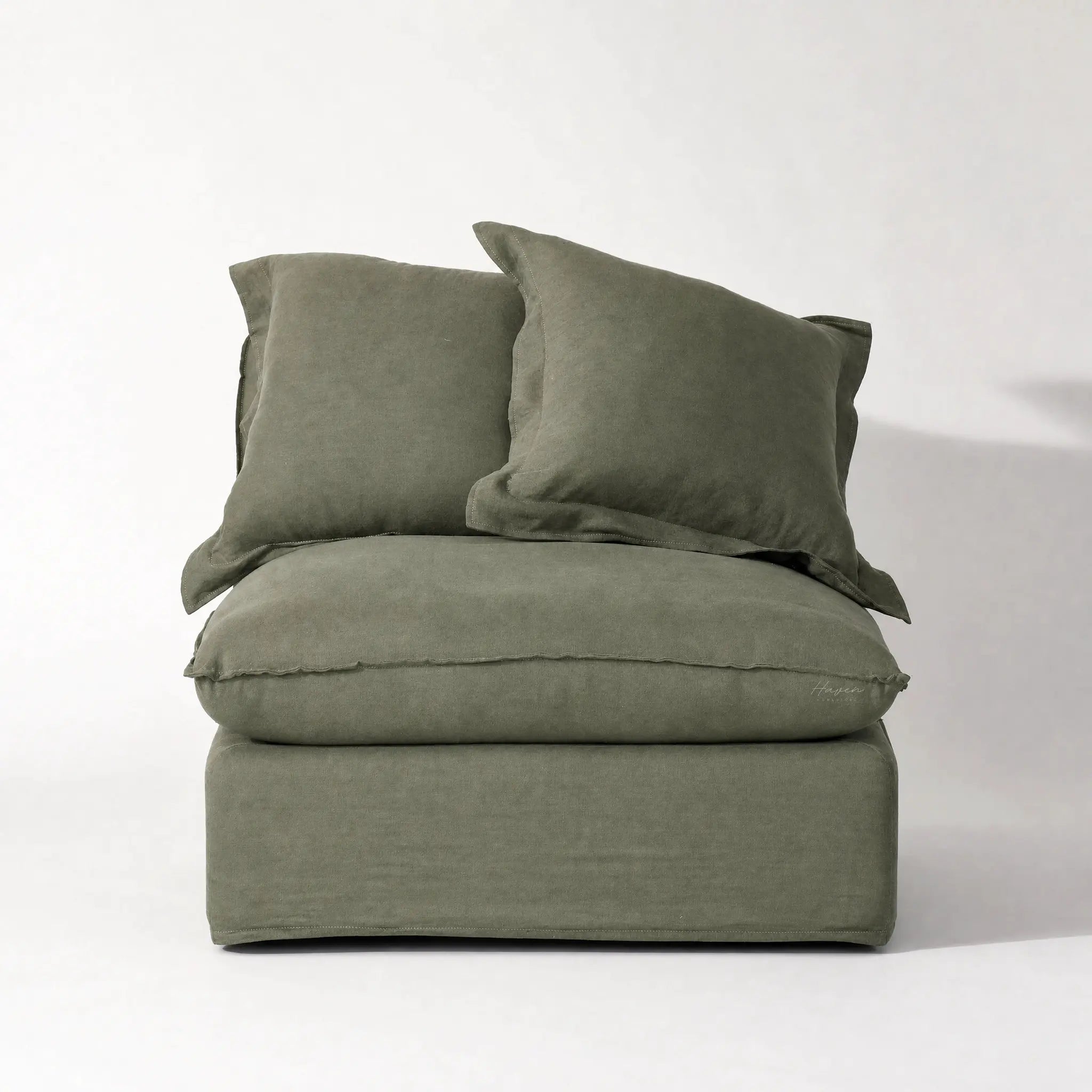 Lotus Modular Sofa Centre cushions in olive Belgian linen upholstery.