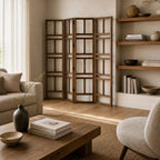 Shoji room divider panels in warm reclaimed elm with a grid design in a cozy living room.