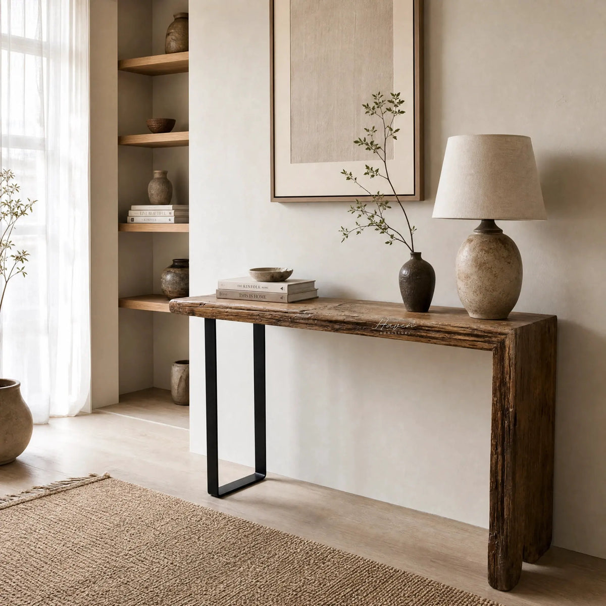 Timberline Reclaimed Console with pine top and steel base in a rustic-modern living room setting.