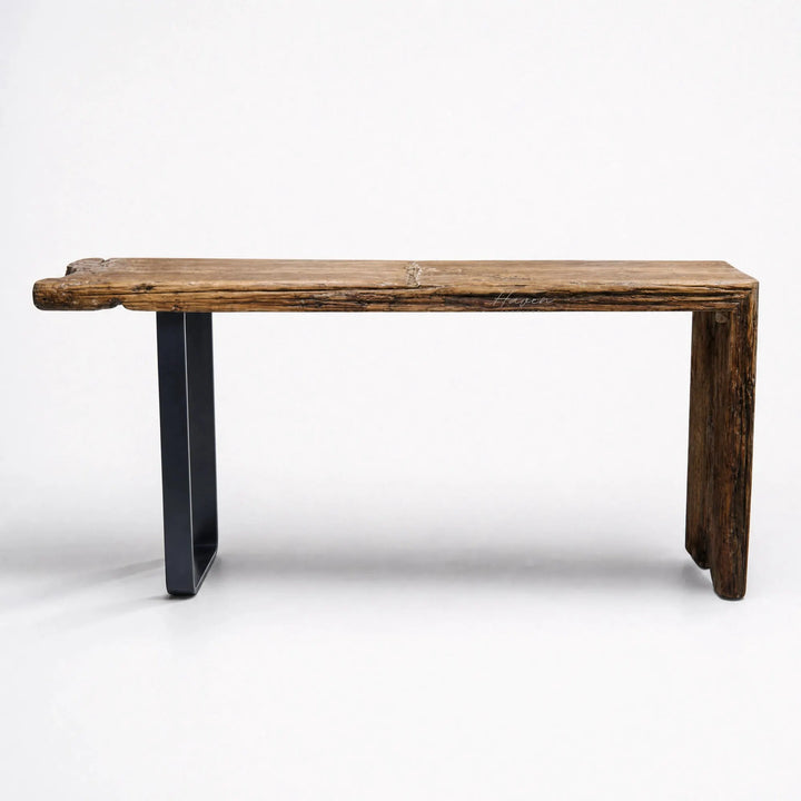 Timberline Reclaimed Console featuring a reclaimed pine top and steel base, highlighting knots and weathered marks.