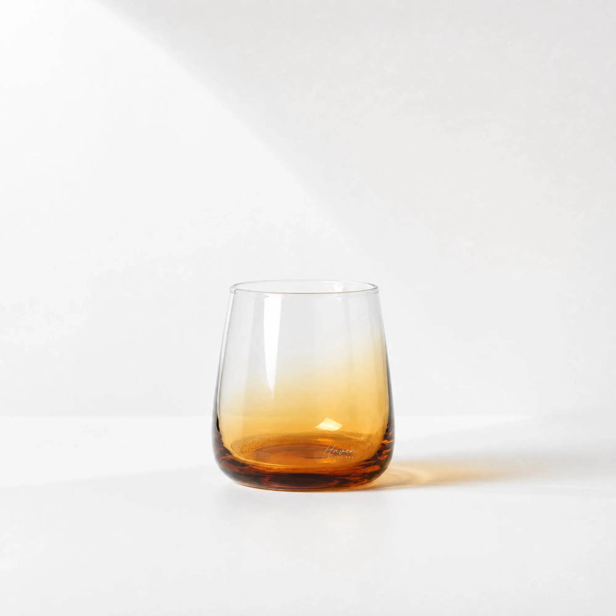 Broste Tumbler Set/8 - Amber: eight mouthblown glasses with a warm amber base.