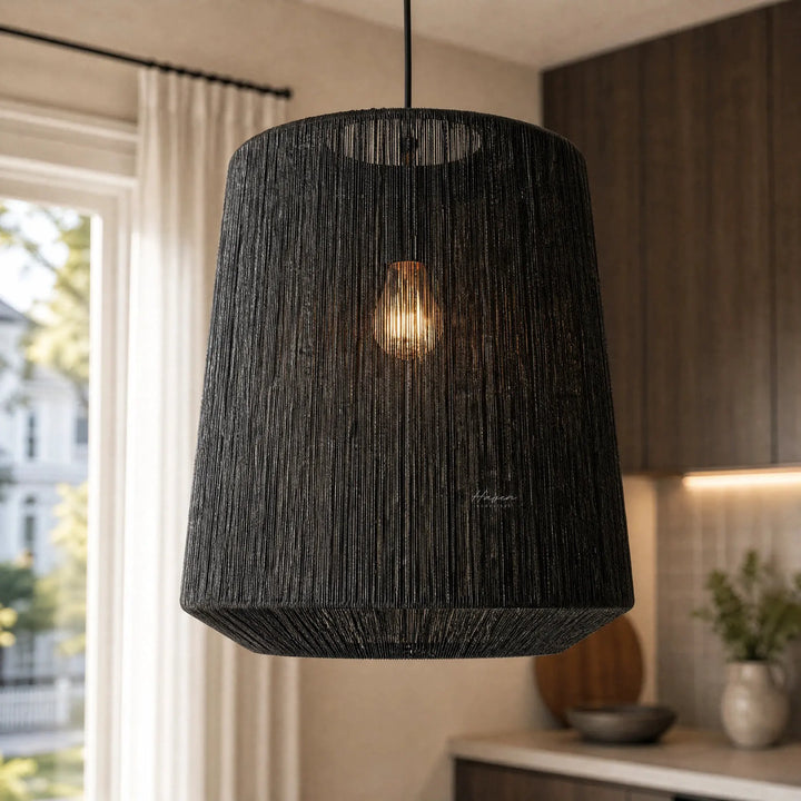 Black Ren Lampshade with woven jute texture, diffused warm light for a cozy, modern interior.