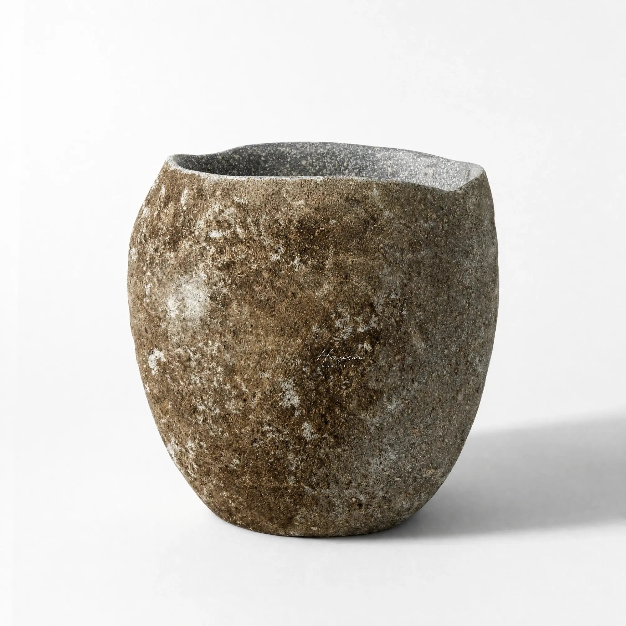 MUUBS Valley Wine Cooler crafted from natural riverstone with textured, speckled finish.
