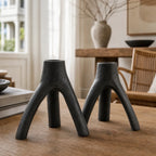 MUUBS Aion Candleholder Set/2 in black cast iron, tree-branch silhouette, sculptural decor.