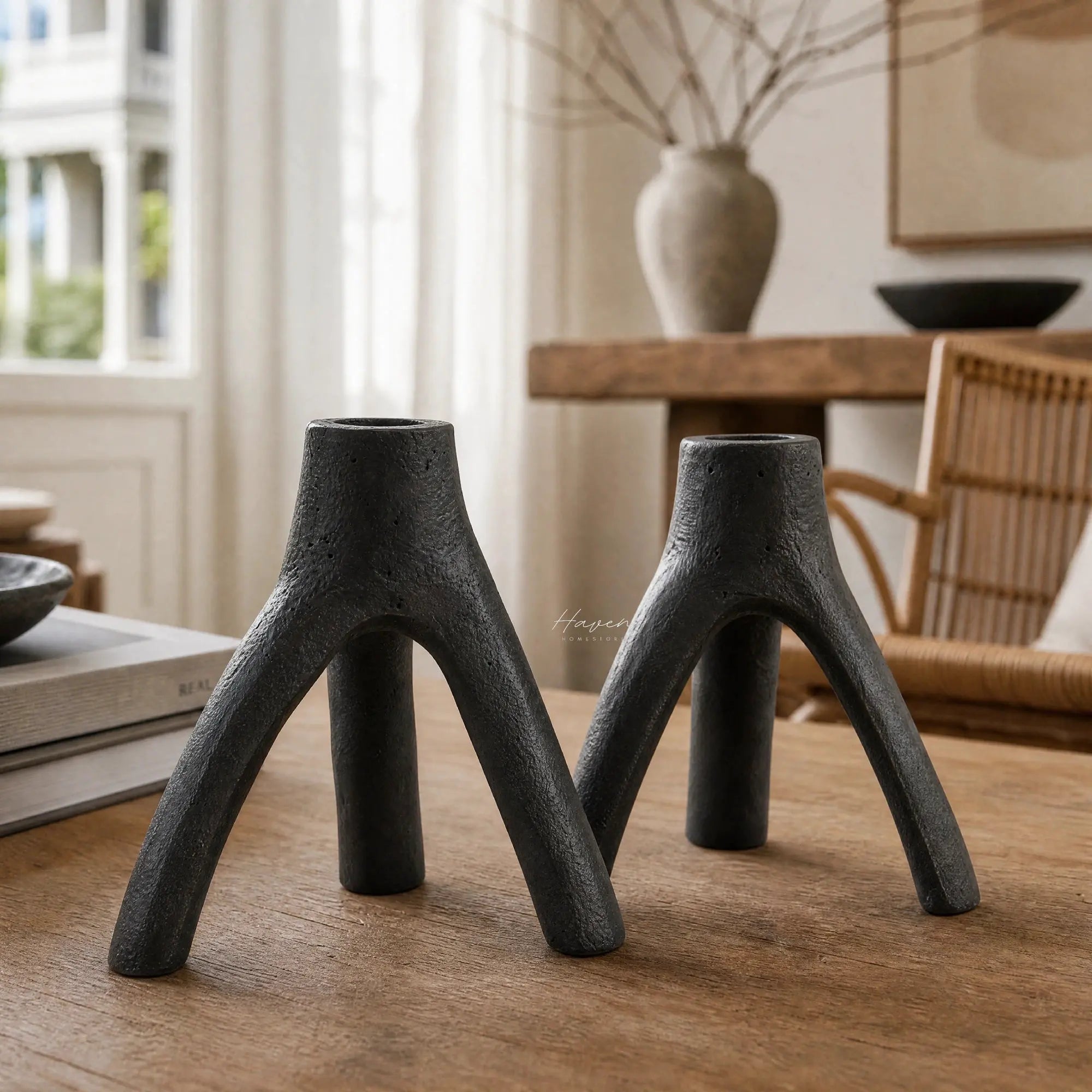 MUUBS Aion Candleholder Set/2 in black cast iron, tree-branch silhouette, sculptural decor.
