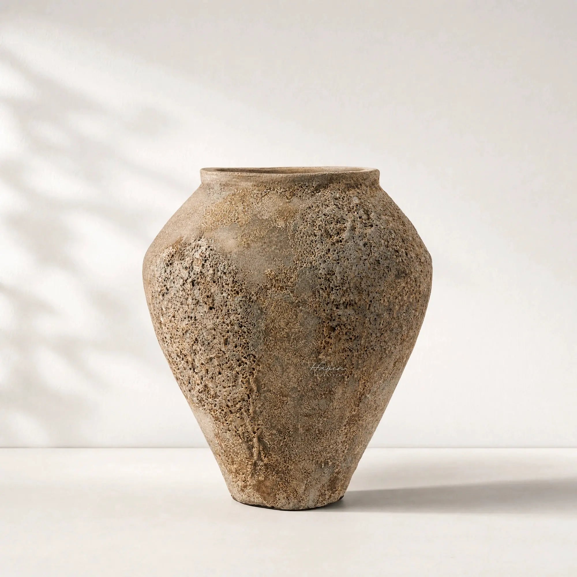 MUUBS Pot Trace 55 Coral/Sand, handcrafted terracotta with layered sand, cement and paint texture.