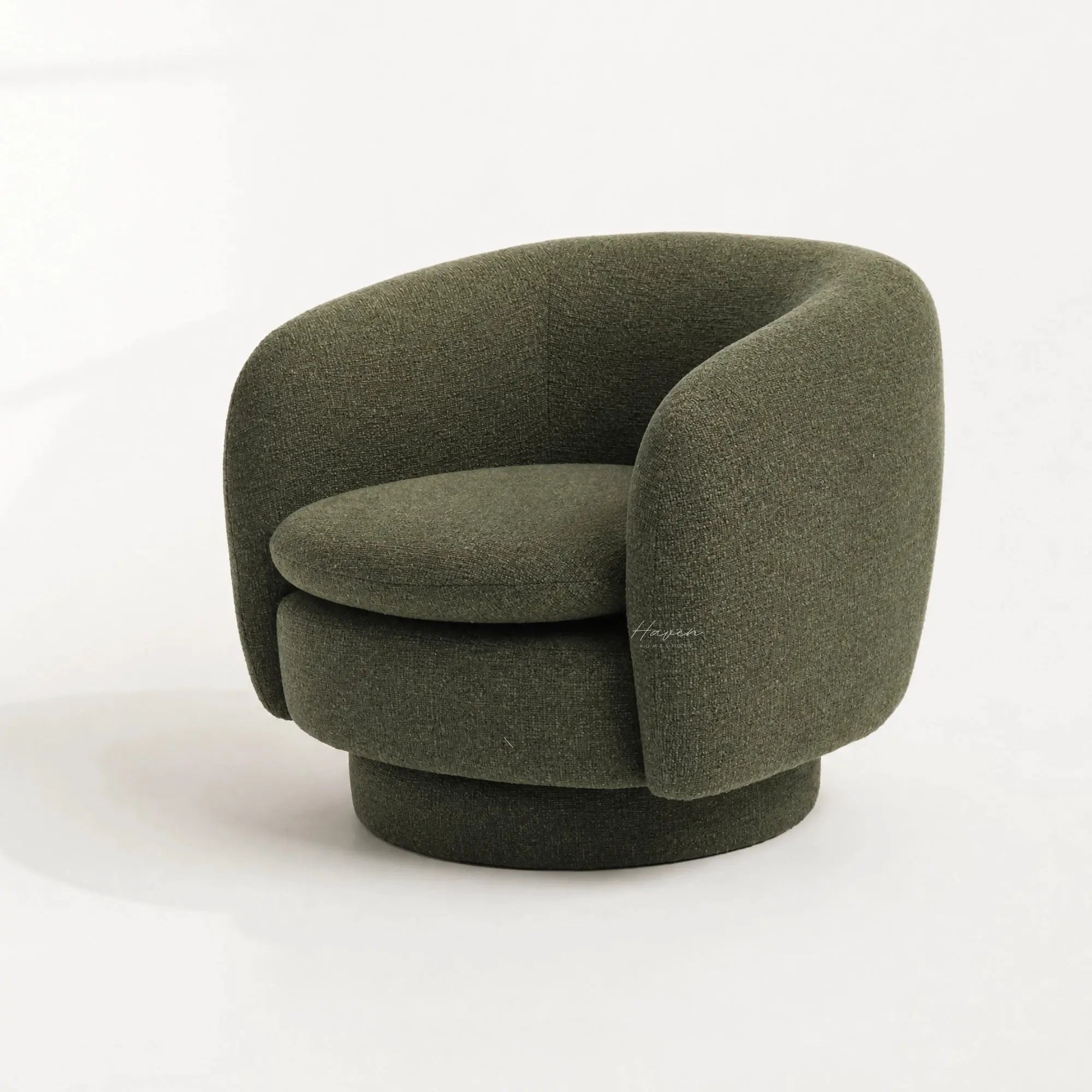 Monika Swivel Chair with a soft sculptural silhouette, curved back, and swivel base.