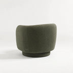 Close-up of the Monika Swivel Chair curved back in dark gray fabric.