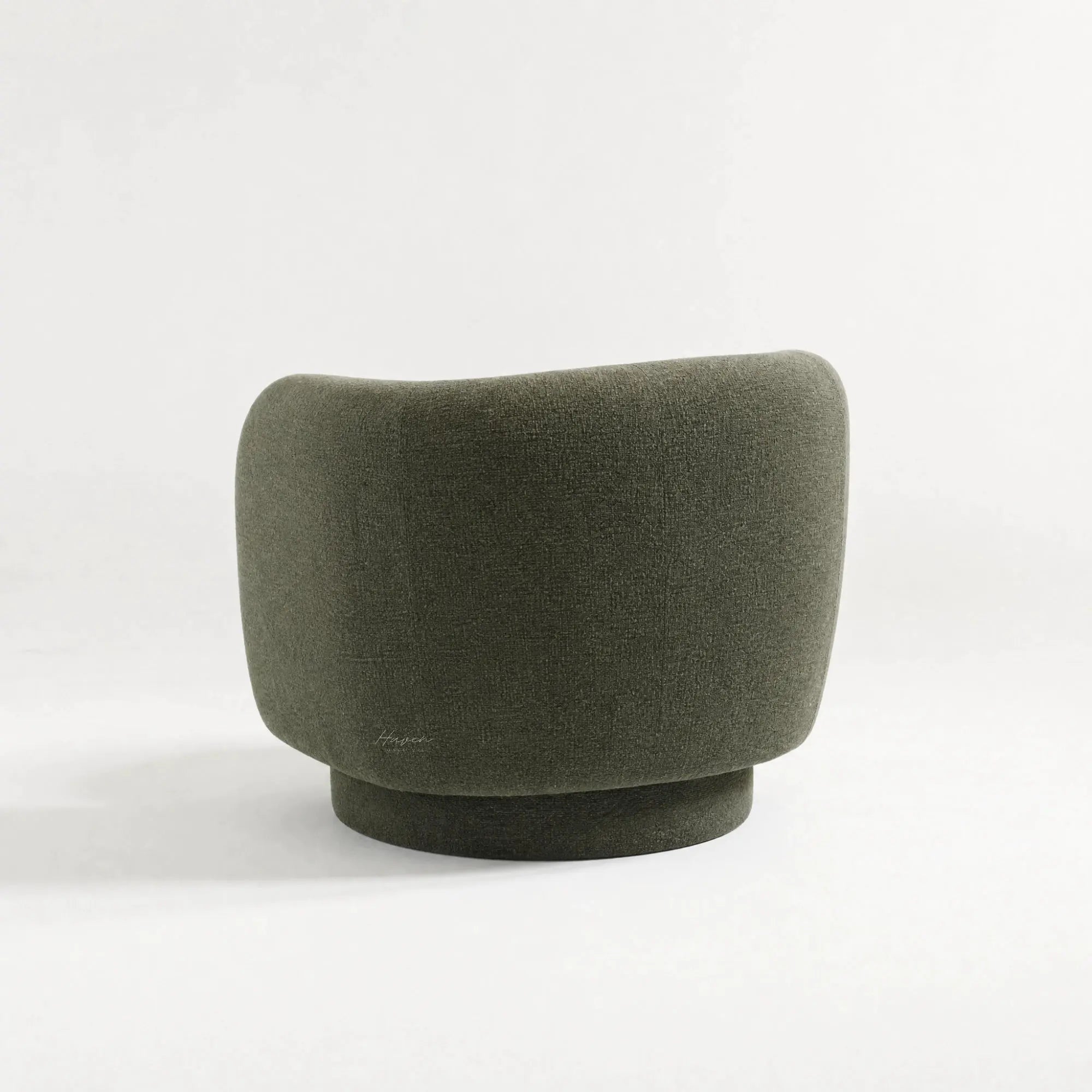 Close-up of the Monika Swivel Chair curved back in dark gray fabric.