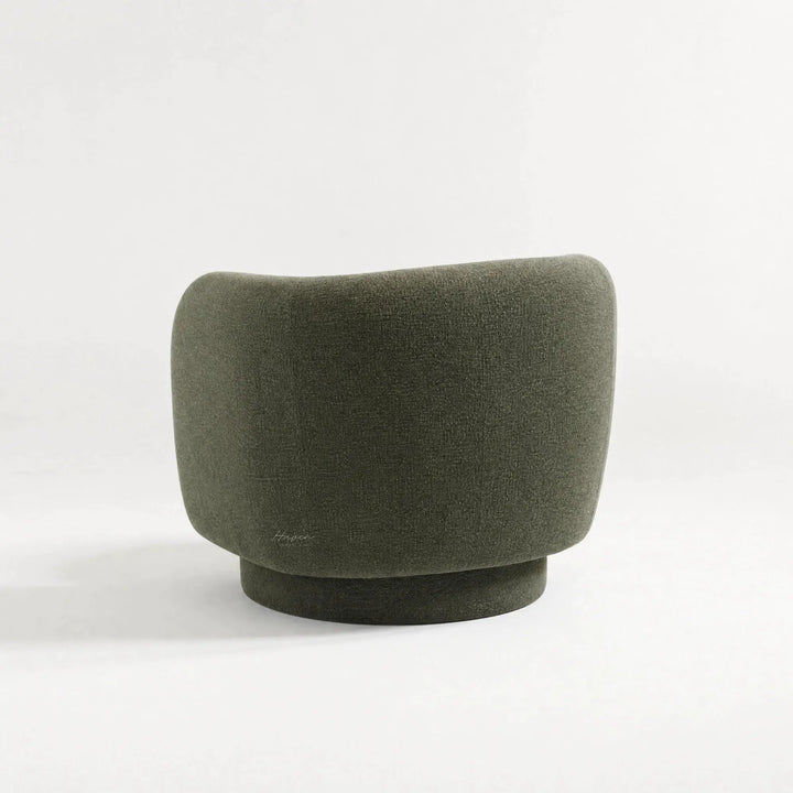 Close-up of the Monika Swivel Chair curved back in dark gray fabric.
