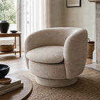 Monika Swivel Chair in Latte with a soft curved back in a bright, neutral living room