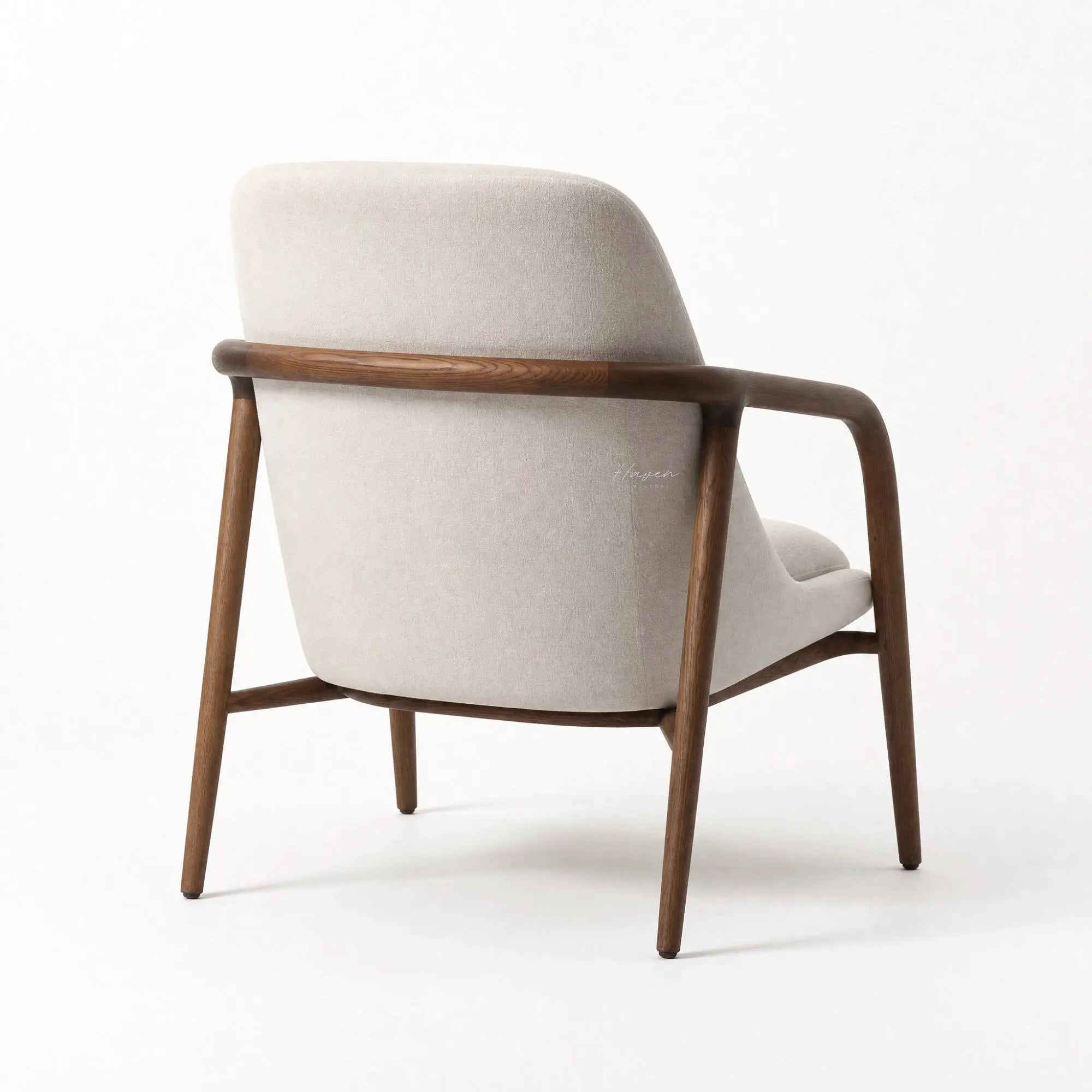 Lund Armchair with solid ash wood frame, cushioned polyester upholstery, and clean Scandinavian design.