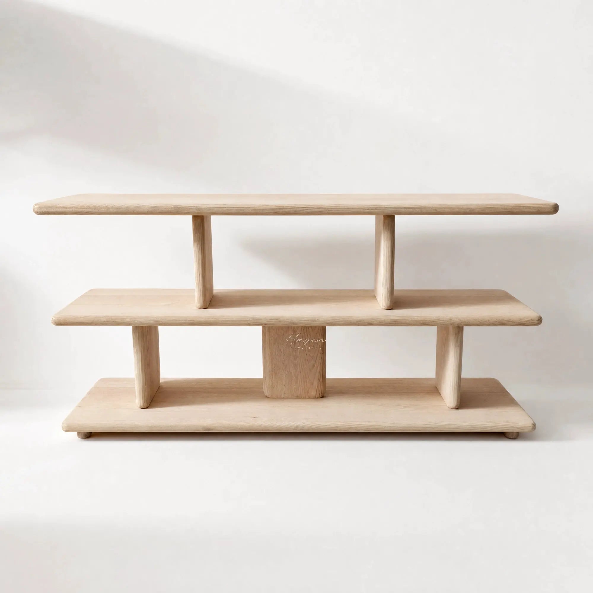Norr Shelves in natural oak, clean layered design for books, ceramics, and treasured objects.