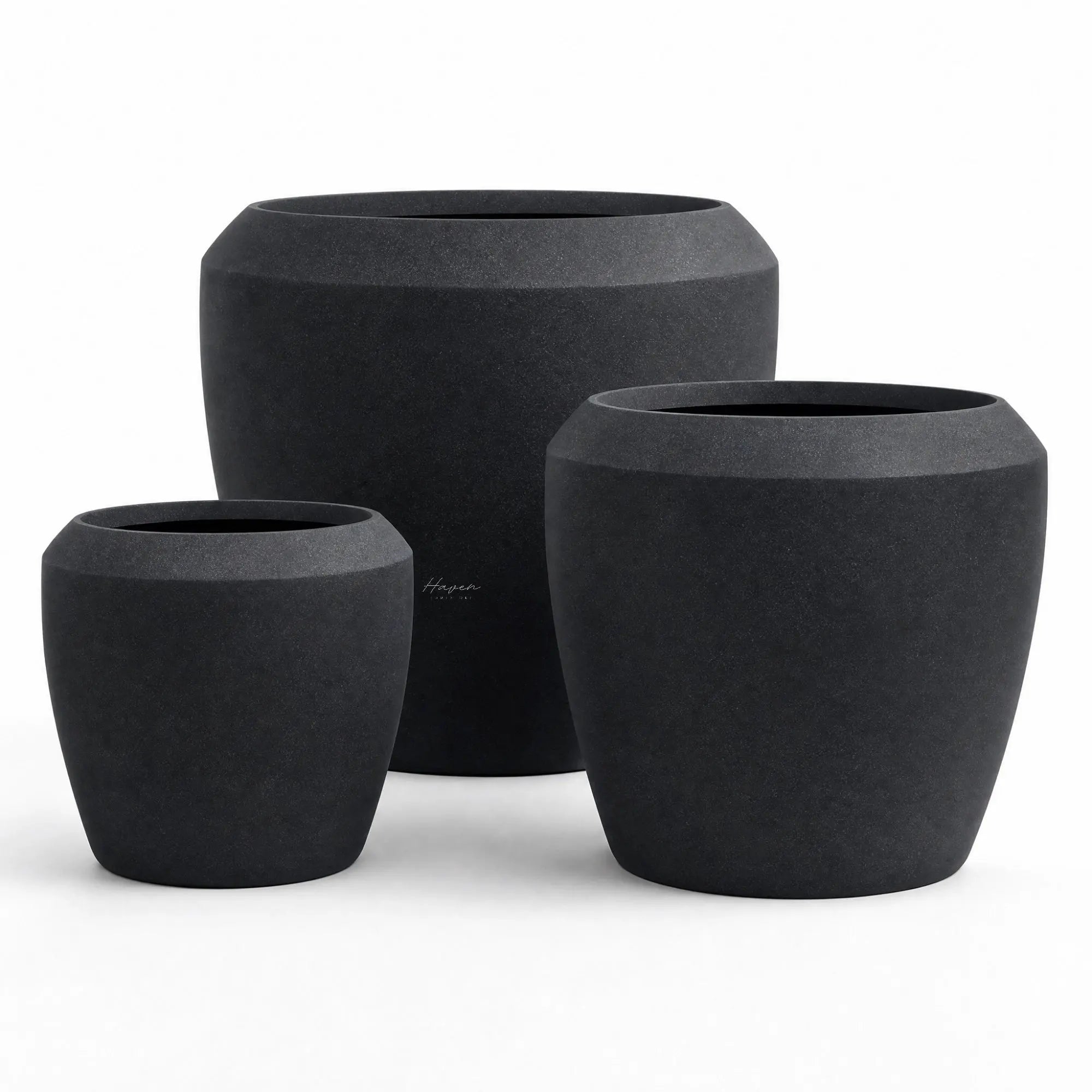 Piha Planters Set/3: trio of dark, matte stone-composite planters for indoor or outdoor spaces.