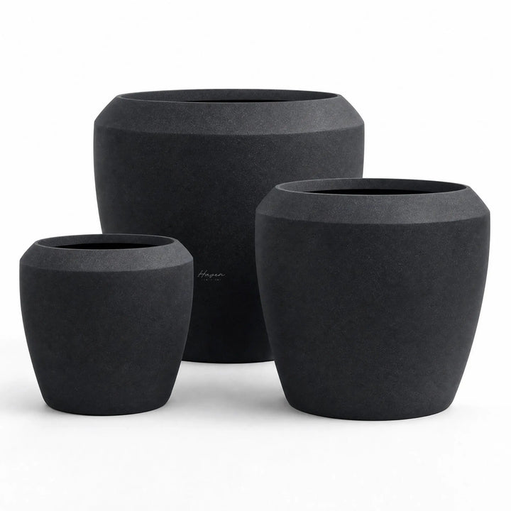 Piha Planters Set/3: trio of dark, matte stone-composite planters for indoor or outdoor spaces.