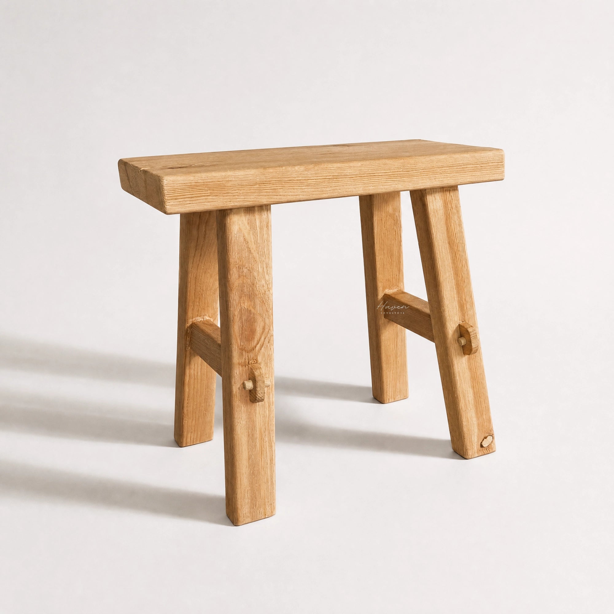 Asken Side Table / Stool in warm reclaimed elm, showcasing distinctive grain, knots and time-worn markings.
