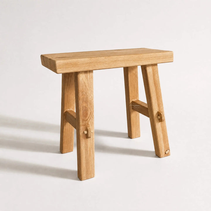 Asken Side Table / Stool in warm reclaimed elm, showcasing distinctive grain, knots and time-worn markings.