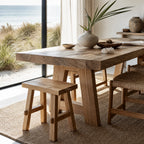 Asken Side Table / Stool in reclaimed elm, showing distinctive grain, knots and time-worn markings in a sunlit room.