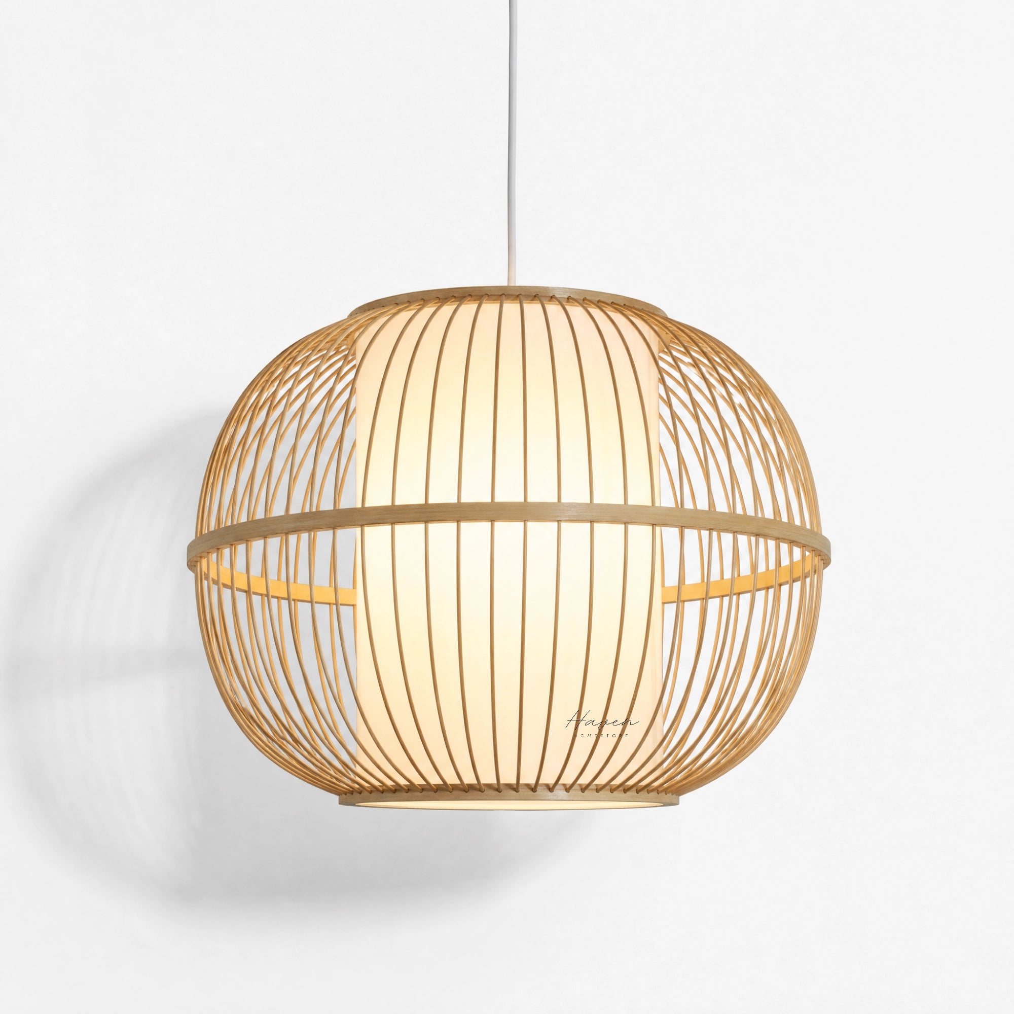 Kura Pendant Light with a bamboo open-weave shade and softly diffused warm glow.