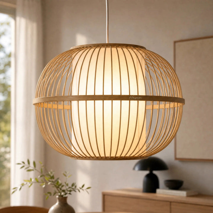 Kura Pendant Light: bamboo open-weave shade with diffused inner glow, warm ambient light.