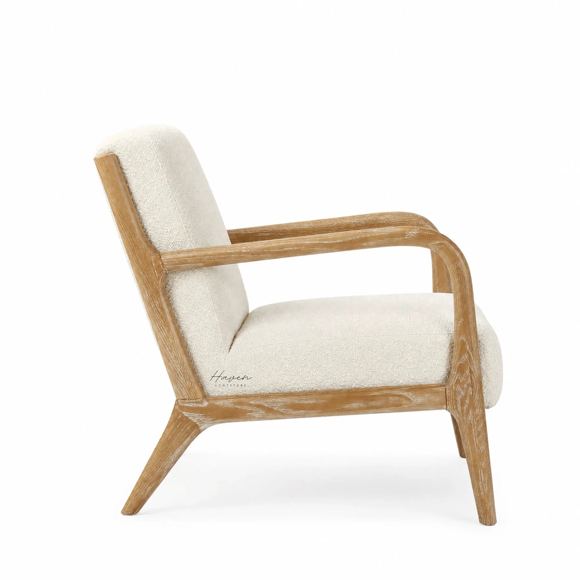 Tairua Lounge Chair in Seafoam upholstery with limewashed oak frame and curved arms.
