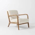Tairua Lounge Chair Seafoam upholstery on limewashed oak frame with curved arms and plush seat.
