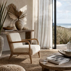 Tairua Lounge Chair in Seafoam upholstery with limewashed oak frame, inviting coastal living.