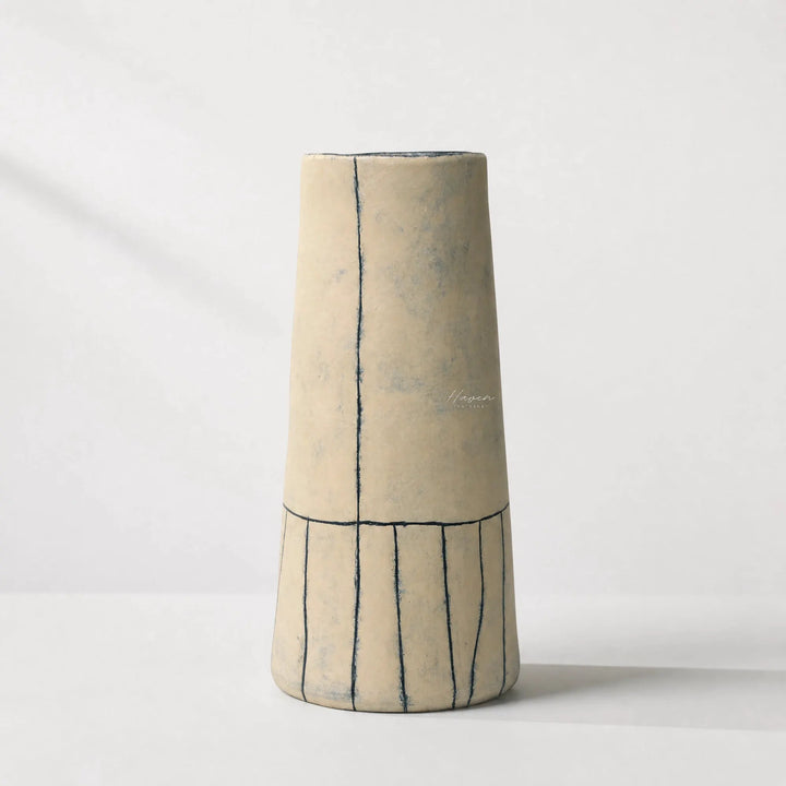 Line Vase handcrafted from terracotta with subtle curves and bold hand-painted blue-black lines.