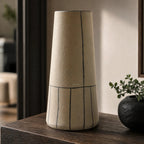 Line Vase handcrafted from terracotta, hand-thrown with hand-painted lines, placed on a wooden table.