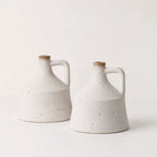 Yukina Vase Set/2: two handcrafted terracotta vases with textured surfaces and warm, natural finish.