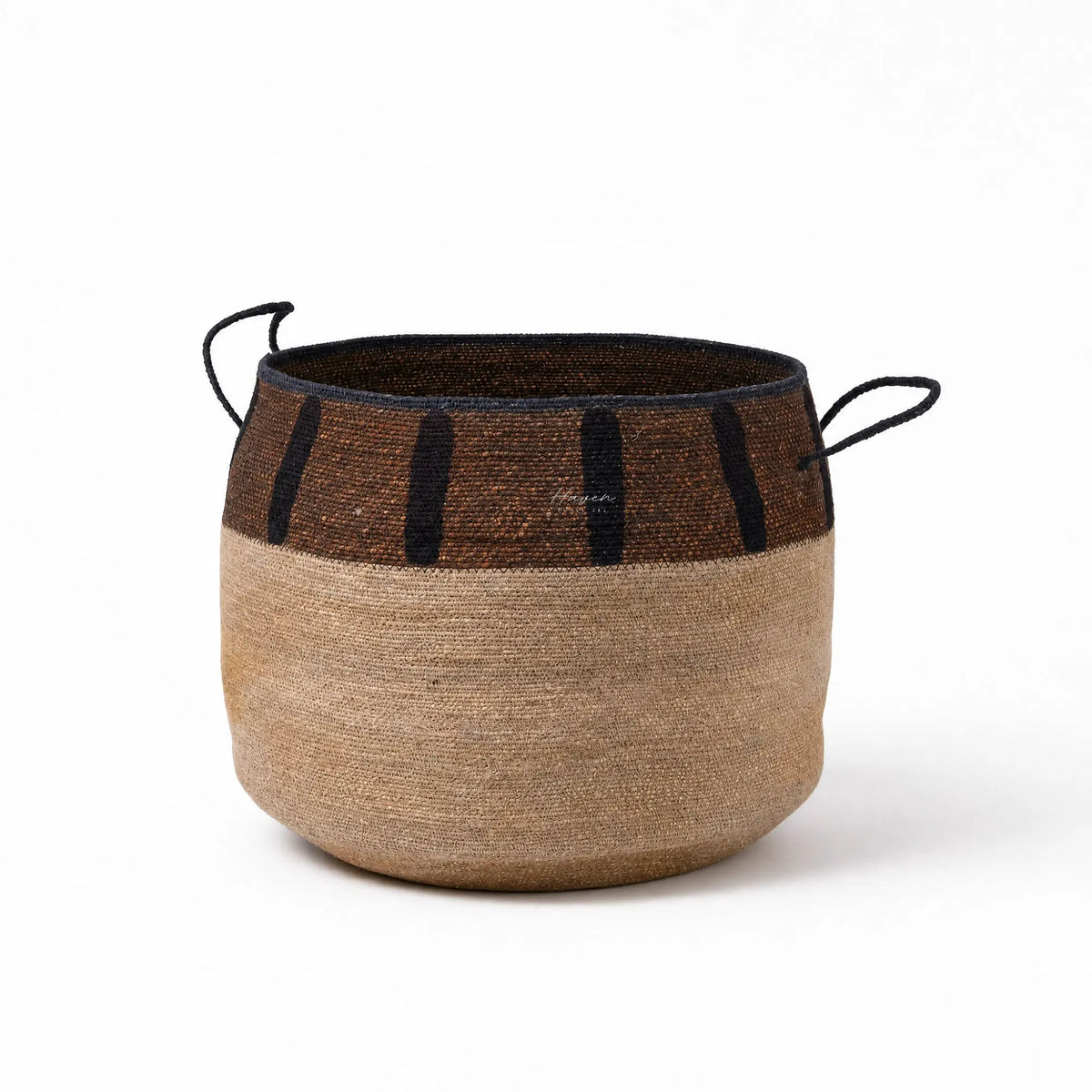 Aarna Basket: handwoven seagrass with a cream body, dark rim, and chocolate stripes.