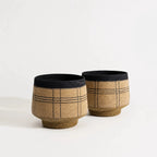 Vamika Basket Set/2: handwoven seagrass baskets with a denim blue crosshatch finish, crafted in India.