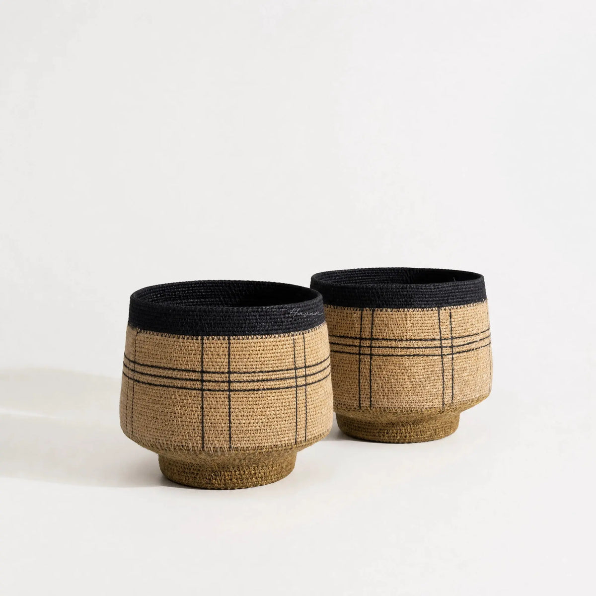 Vamika Basket Set/2: handwoven seagrass baskets with a denim blue crosshatch finish, crafted in India.