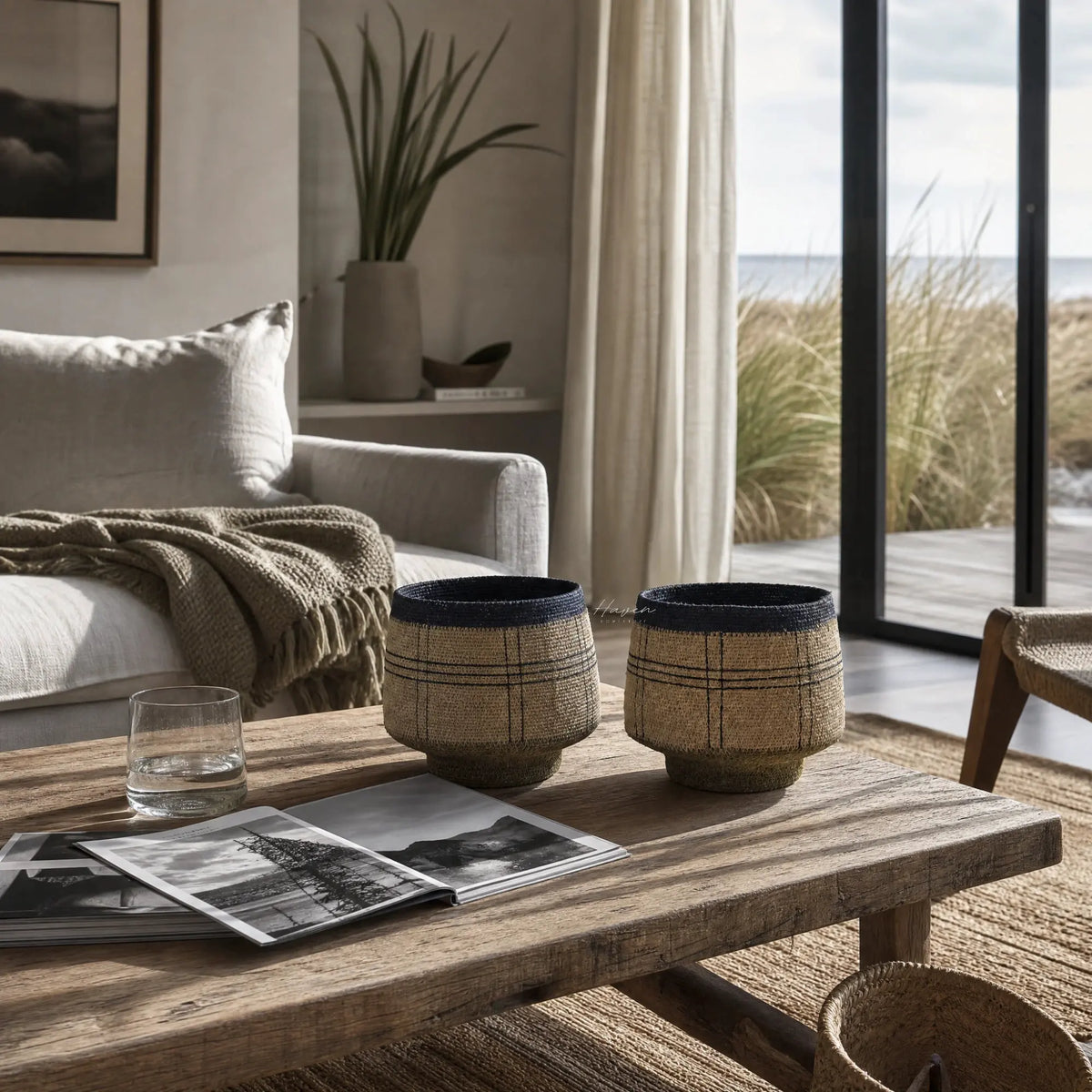 Vamika Basket Set/2: two handcrafted seagrass baskets with crosshatch pattern in denim blue.