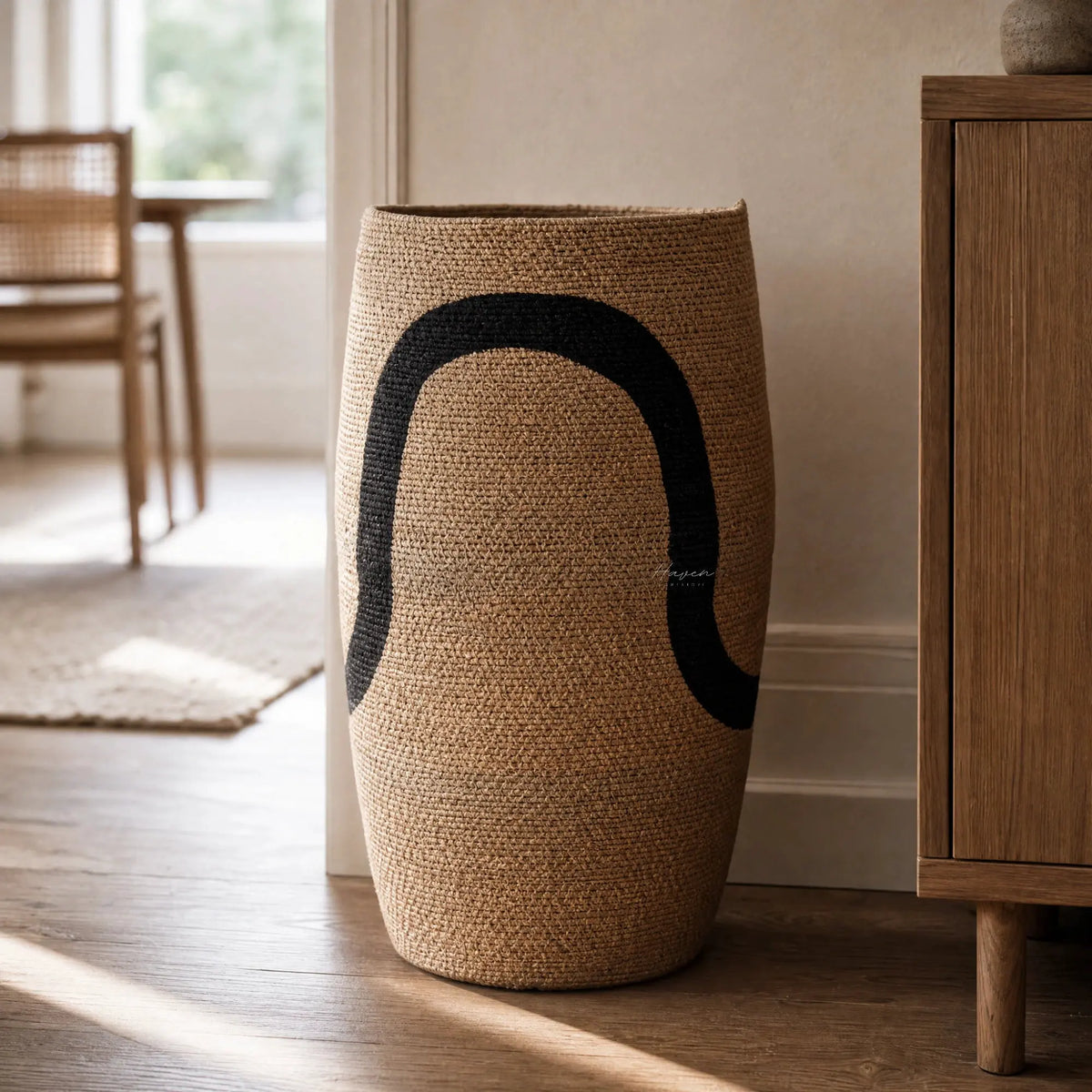 Sana Basket Set/2, handcrafted in India from natural seagrass, two baskets with bold curved black design.
