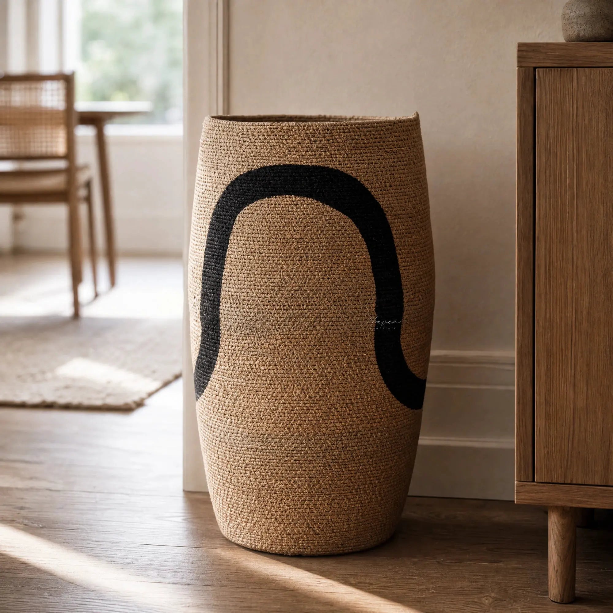 Sana Basket Set/2, handcrafted in India from natural seagrass, two baskets with bold curved black design.