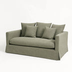 Coast 2 Seat Sofa - Sage in soft cotton-blend slipcover with plush cushions.