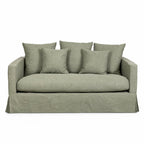 Coast 2 Seat Sofa in sage slipcover with plush cushions in cotton-blend fabric.