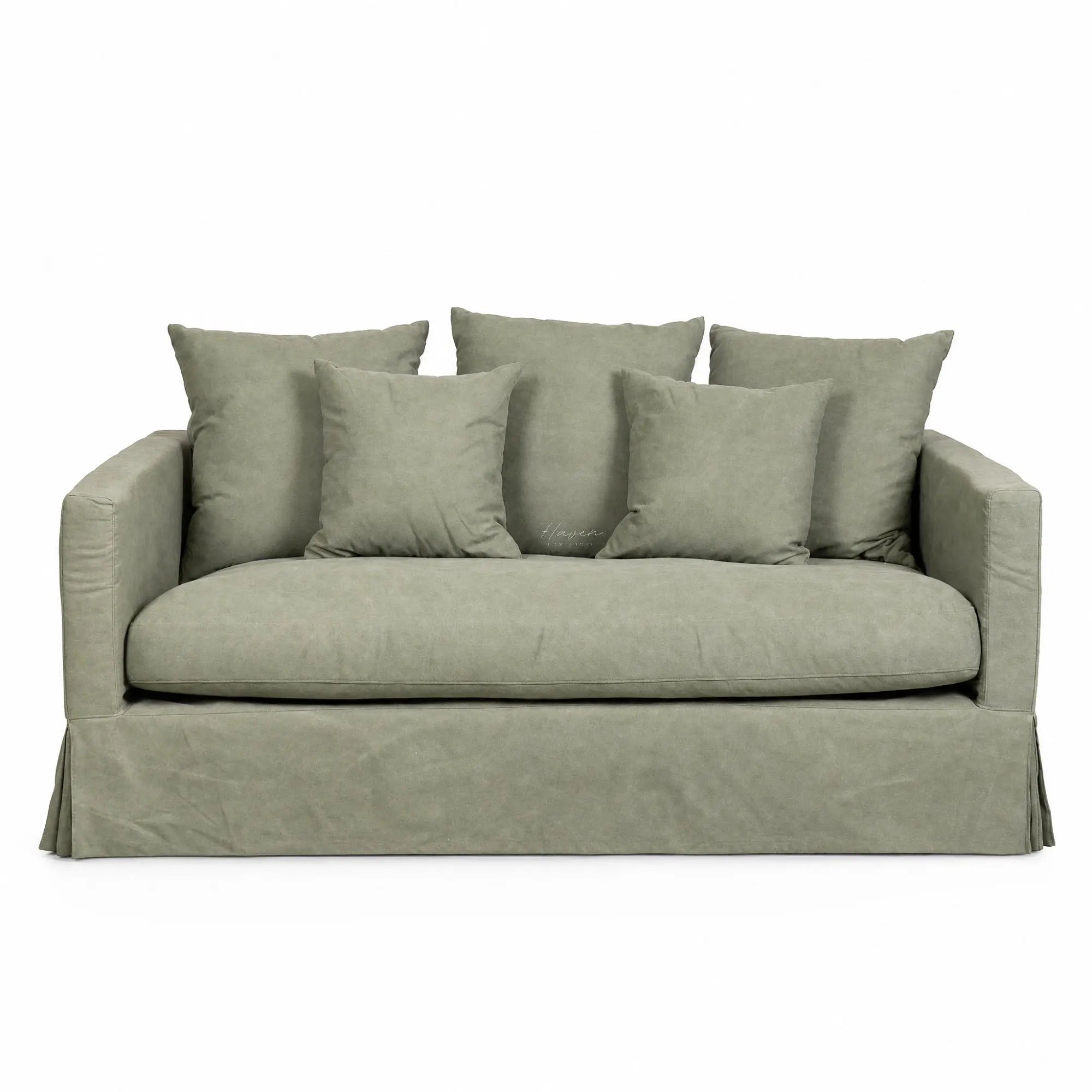 Coast 2 Seat Sofa in sage slipcover with plush cushions in cotton-blend fabric.