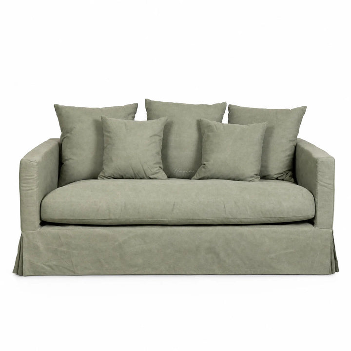 Coast 2 Seat Sofa in sage slipcover with plush cushions in cotton-blend fabric.