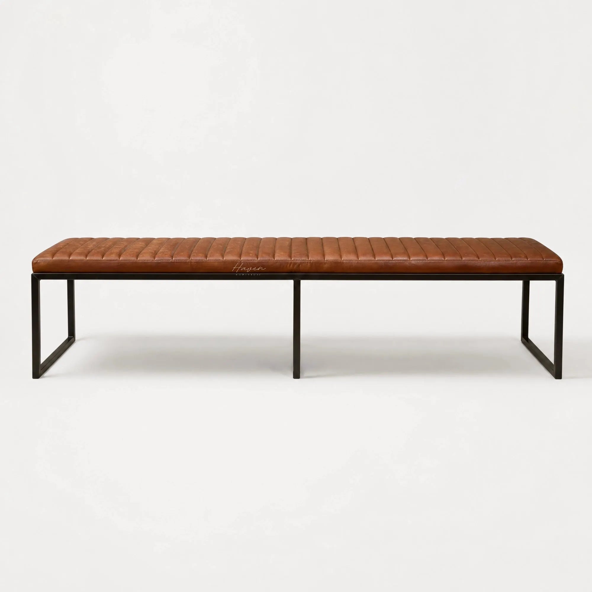 Pure® Sabina Bench with buffalo leather upholstery and a matt black metal frame.