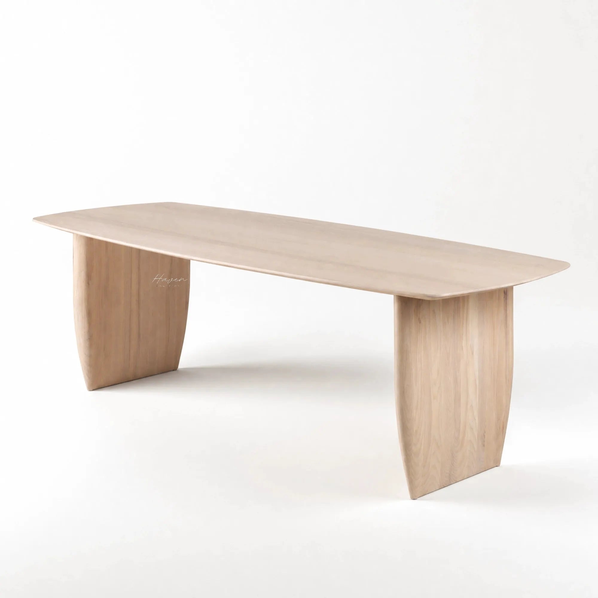 Alva Dining Table in solid ash with milkwash finish and sculptural, wide block legs.