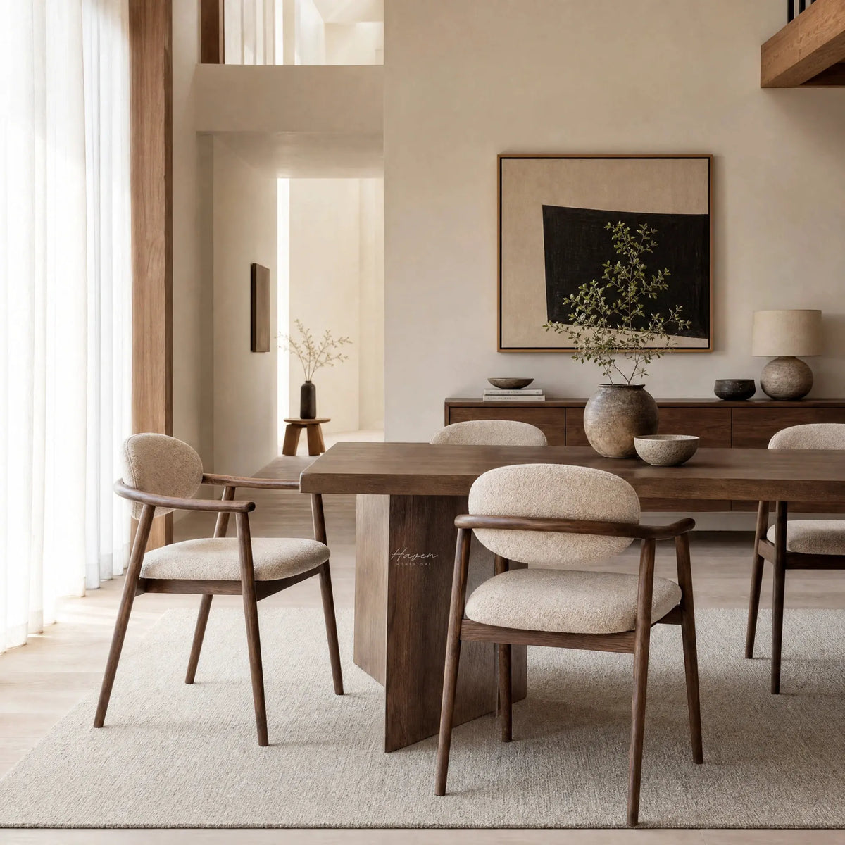Aster Dining Chairs with solid ash frames and upholstered seats in a Japandi-inspired, gently curved silhouette.