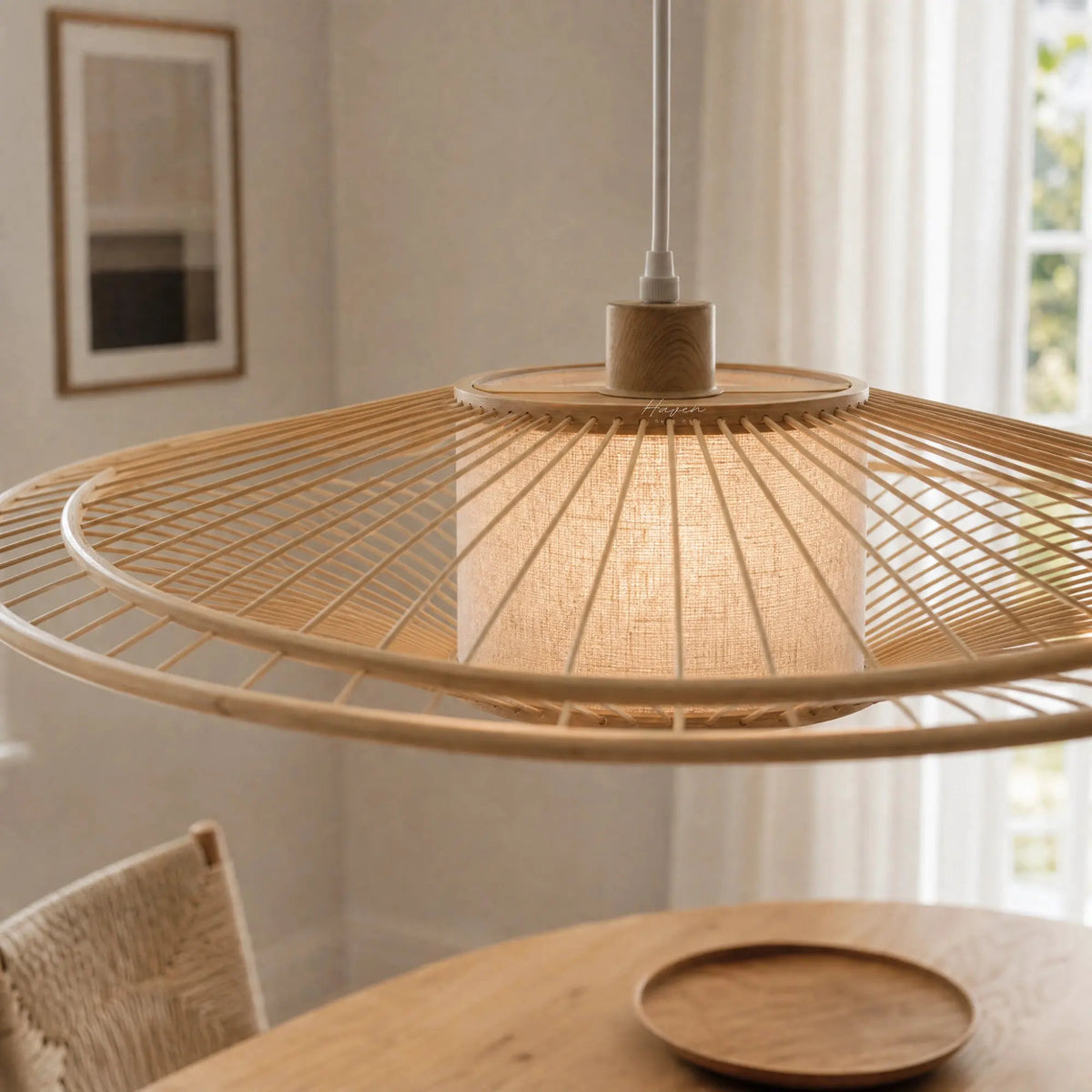 Soren Pendant Light handcrafted from bamboo with a circular slatted shade and linen diffuser, warm glow.