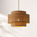 Loom Pendant Light with layered bamboo woven shades, hanging from a slim cord, warm Japandi-inspired glow.