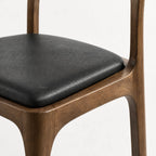 Ellison Dining Chair, Walnut finish with solid ash frame and black leather seat.