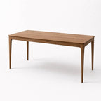 Ellison Dining Table with solid American Ash legs and veneer top, mid-century warmth and clean lines.