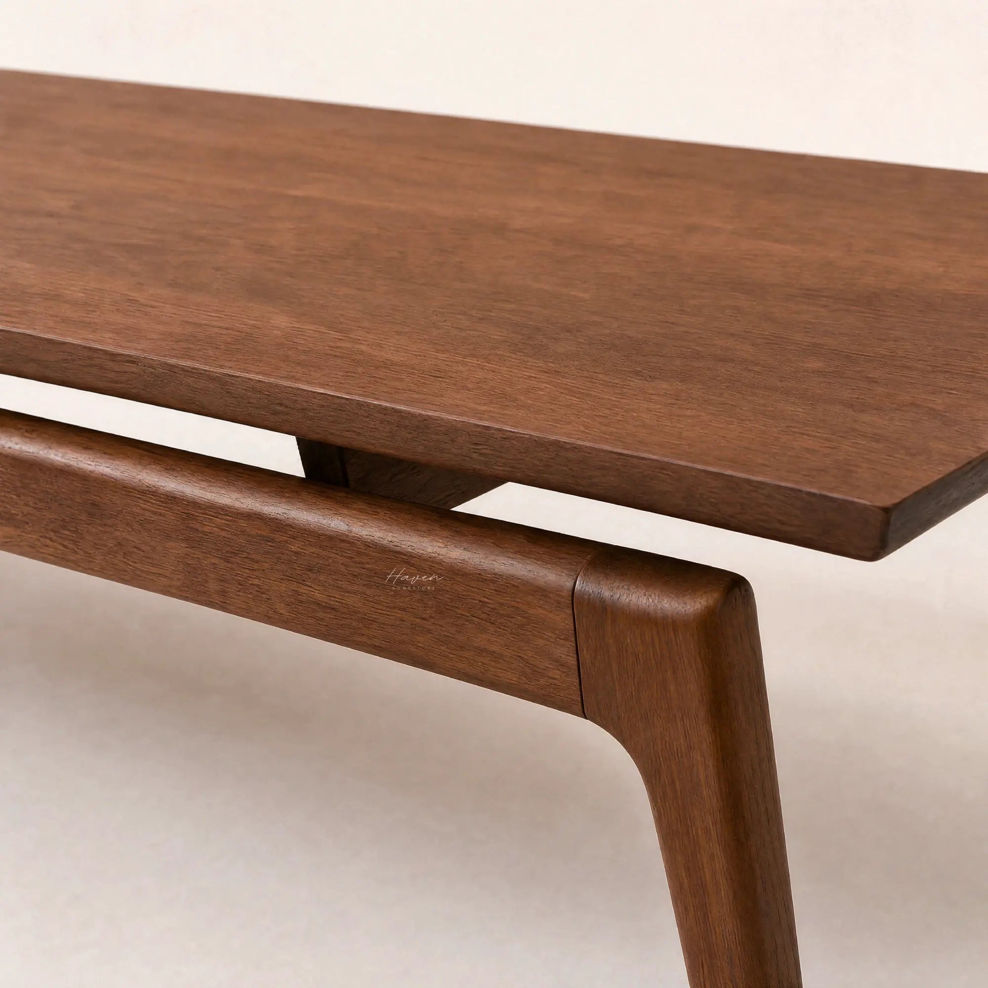 Rowan Coffee Table leg in warm American ash with mid-century curved silhouette.