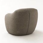 Ingrid Swivel Chair - Tundra with textured poly-mix upholstery and softly curved silhouette.