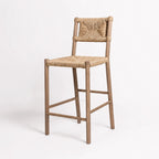 Drift Counter Stool with a solid oak frame and handwoven seagrass seat and backrest.
